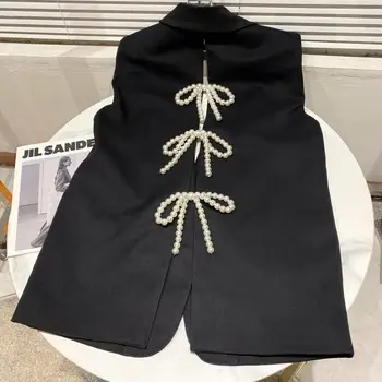 2021 Podzimní Dámské Oblečení Nové Sexy Zadní Štěrbinu Pearl Luk Design Oblek Vesta Volné Ukázat Tenké Černé Temperament Kabát Ženský